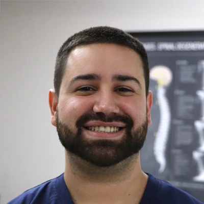 A headshot photo of Jordan, a massage therapist at Maan Chiropractic